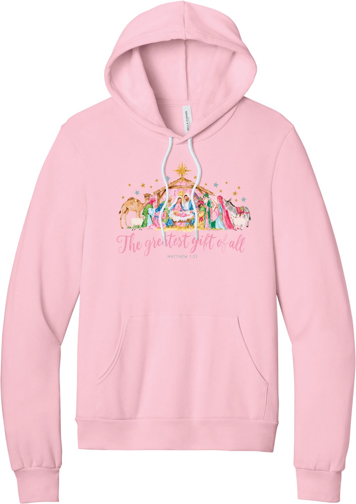 The Greatest Gift of All hoodie in Pink, featuring a pastel watercolor nativity scene under the star with The Greatest Gift of All script and Matthew 1:21