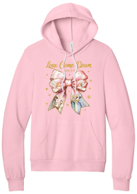 Love Came Down Nativity Bow hoodie in Pink, featuring a blush satin bow with painted nativity scenes under gold Love Came Down script and Luke 2:11