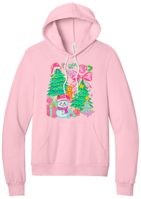 Preppy Christmas Doodle hoodie in Pink, featuring a doodle collage of Christmas trees, a snowman, a gingerbread man, gifts, and pink bows