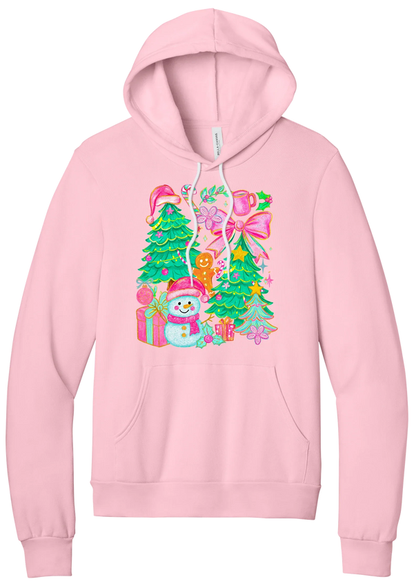 Preppy Christmas Doodle hoodie in Pink, featuring a doodle collage of Christmas trees, a snowman, a gingerbread man, gifts, and pink bows