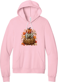 All Stacked Up hoodie in Pink, featuring three stacked pumpkins in polka dot, checkerboard, and leopard with autumn leaves