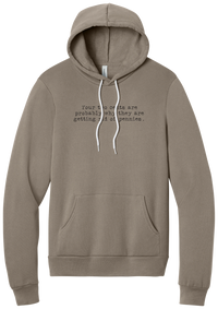 Your Two Cents hoodie in Tan, featuring Your two cents are probably why they are getting rid of pennies in distressed black typewriter letters