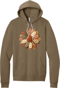 Patchwork Fabric Flower hoodie in Vintage Brown, featuring an oversized fabric flower with plaid, gingham, calico, and cable knit petals around a stitched rust center