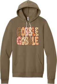 Gobble Gobble Patchwork hoodie in Vintage Brown, featuring Gobble Gobble in bubble letters filled with leopard, gingham, checkerboard, stars, and pumpkin prints