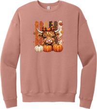 Highland Cozy crewneck sweatshirt in Mauve, featuring a fluffy highland cow calf in a buffalo check bow with pumpkins and painted autumn stripes