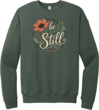 Be Still crewneck sweatshirt in Military Green, featuring Be Still in hand lettered script with a coral poppy, greenery, and Psalm 46:10