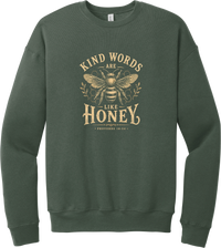 Kind Words Honey Bee crewneck sweatshirt in Military Green, featuring Kind Words Are Like Honey in arched vintage lettering around a golden honey bee and honeycomb with Proverbs 16:24