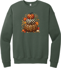 All Stacked Up crewneck sweatshirt in Military Green, featuring three stacked pumpkins in polka dot, checkerboard, and leopard with autumn leaves