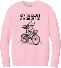 Off to Cause a Kerfuffle crewneck sweatshirt in Pink, featuring a caped frog riding a vintage bicycle with Off to cause a kerfuffle