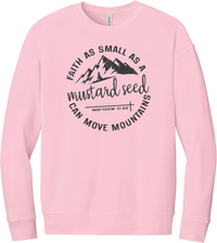 Mustard Seed Faith crewneck sweatshirt in Pink, featuring a circle badge of mountains and a cross with Faith as Small as a Mustard Seed Can Move Mountains lettering and Matthew 17:20