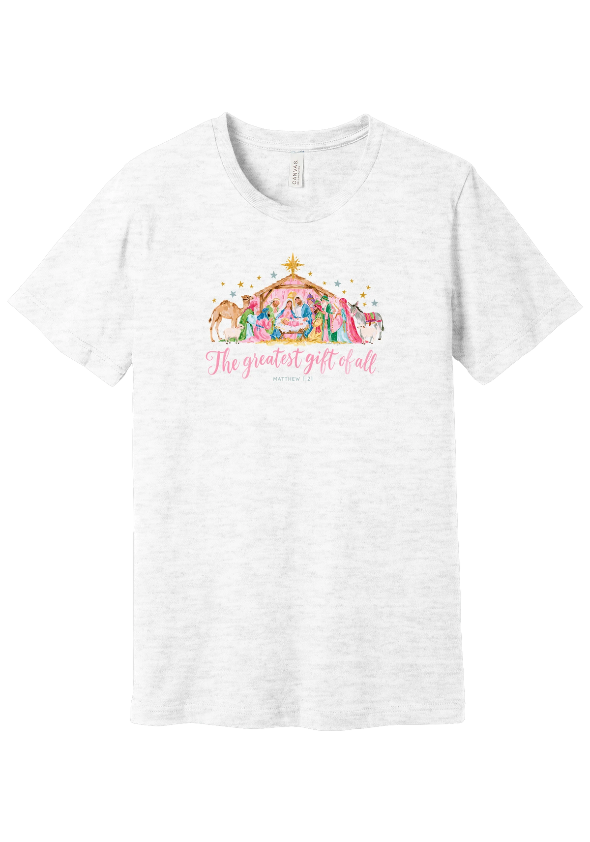 The Greatest Gift of All tee in Ash, featuring a soft watercolor nativity scene beneath the star with Matthew 1:21