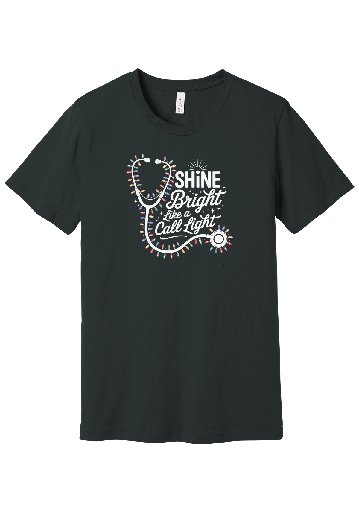 Shine Bright Like a Call Light tee in Dark Grey, featuring a white stethoscope wrapped in multicolor Christmas lights with bold Shine Bright Like a Call Light lettering