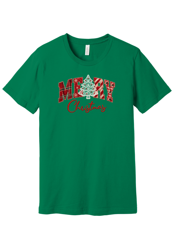 Merry Lace and Pattern Applique tee in Kelly Green, featuring faux applique MERRY letters in red plaid, snowflake, candy cane, and gingham fabrics with a lace Christmas tree and red script Christmas