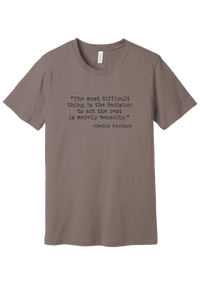 Amelia Earhart Tenacity Quote tee in Pebble Brown, featuring The most difficult thing is the decision to act the rest is merely tenacity in distressed black typewriter letters
