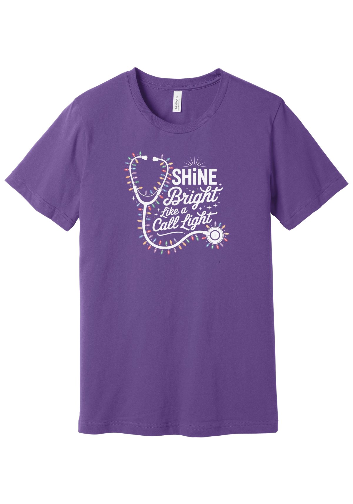 Shine Bright Like a Call Light tee in Royal Purple, featuring a white stethoscope wrapped in multicolor Christmas lights with bold Shine Bright Like a Call Light lettering