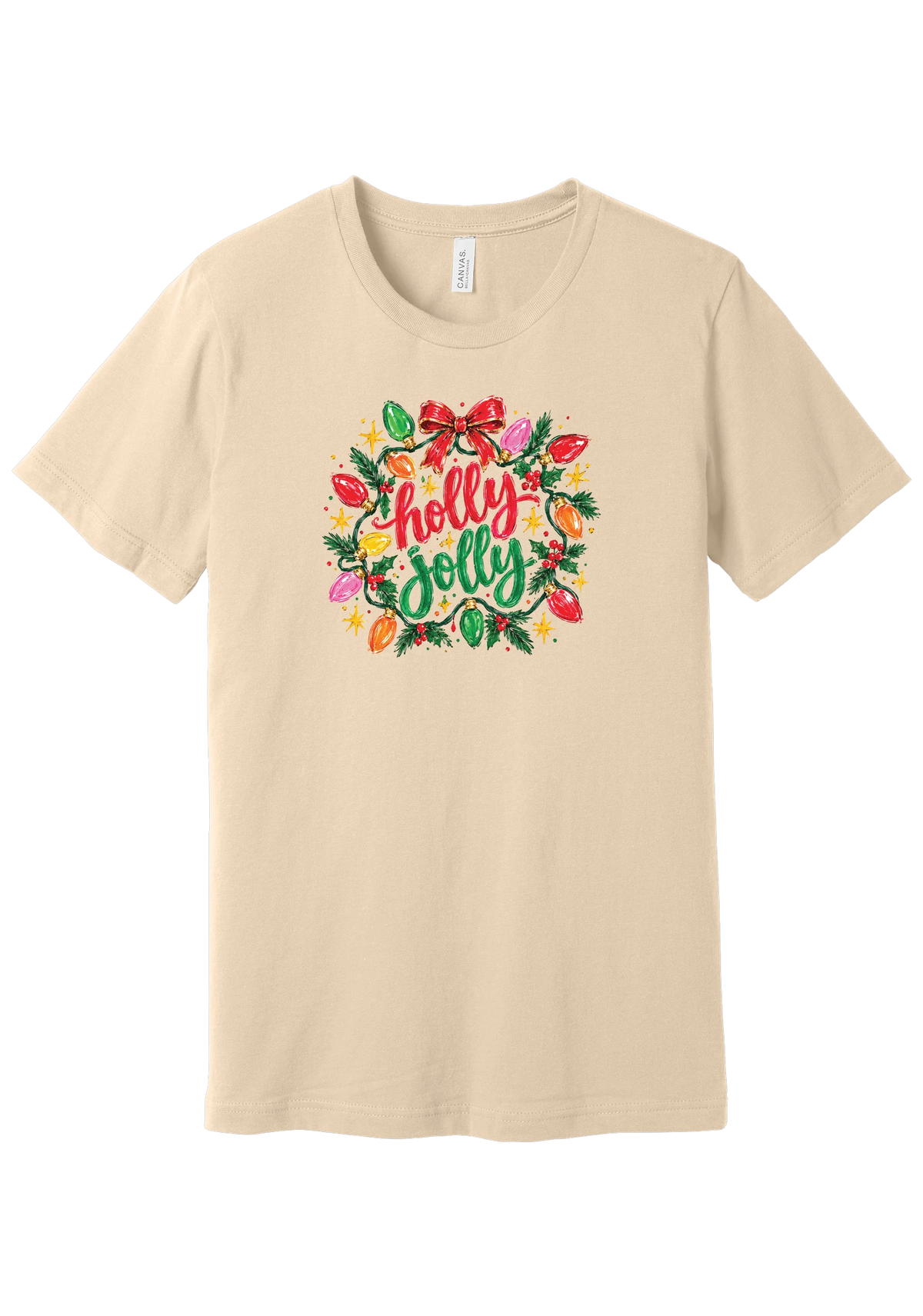 Holly Jolly Christmas Lights tee in Soft Cream, featuring hand-lettered holly jolly script framed by vintage bulb lights, holly, and a big red bow