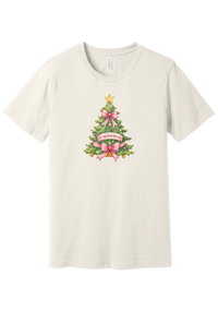 Adore Him Bow Tree tee in Vintage White, featuring a green Christmas tree dressed in pink bows and a gold star with an Oh Come Let Us Adore Him banner