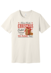 Farm Fresh Christmas Cookies tee in Vintage White, featuring a vintage farmhouse bakery sign with a stack of Christmas cookies tied in a red ribbon bow