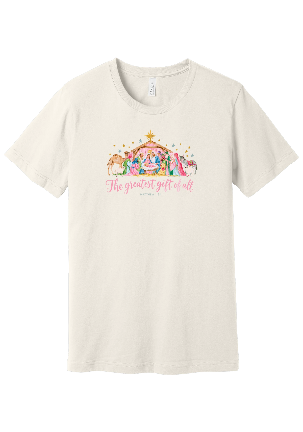 The Greatest Gift of All tee in Vintage White, featuring a soft watercolor nativity scene beneath the star with Matthew 1:21