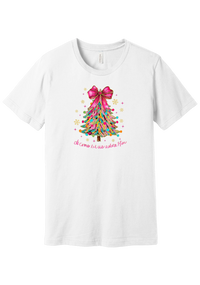 Adore Him Ribbon Tree tee in White, featuring a colorful ribbon Christmas tree topped with a hot pink bow over Oh Come Let Us Adore Him script