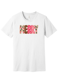 Merry Preppy Applique tee in White, featuring faux applique MERRY letters in pink and green patchwork patterns with trees, gingham, Santas, polka dots, and candy cane stripes