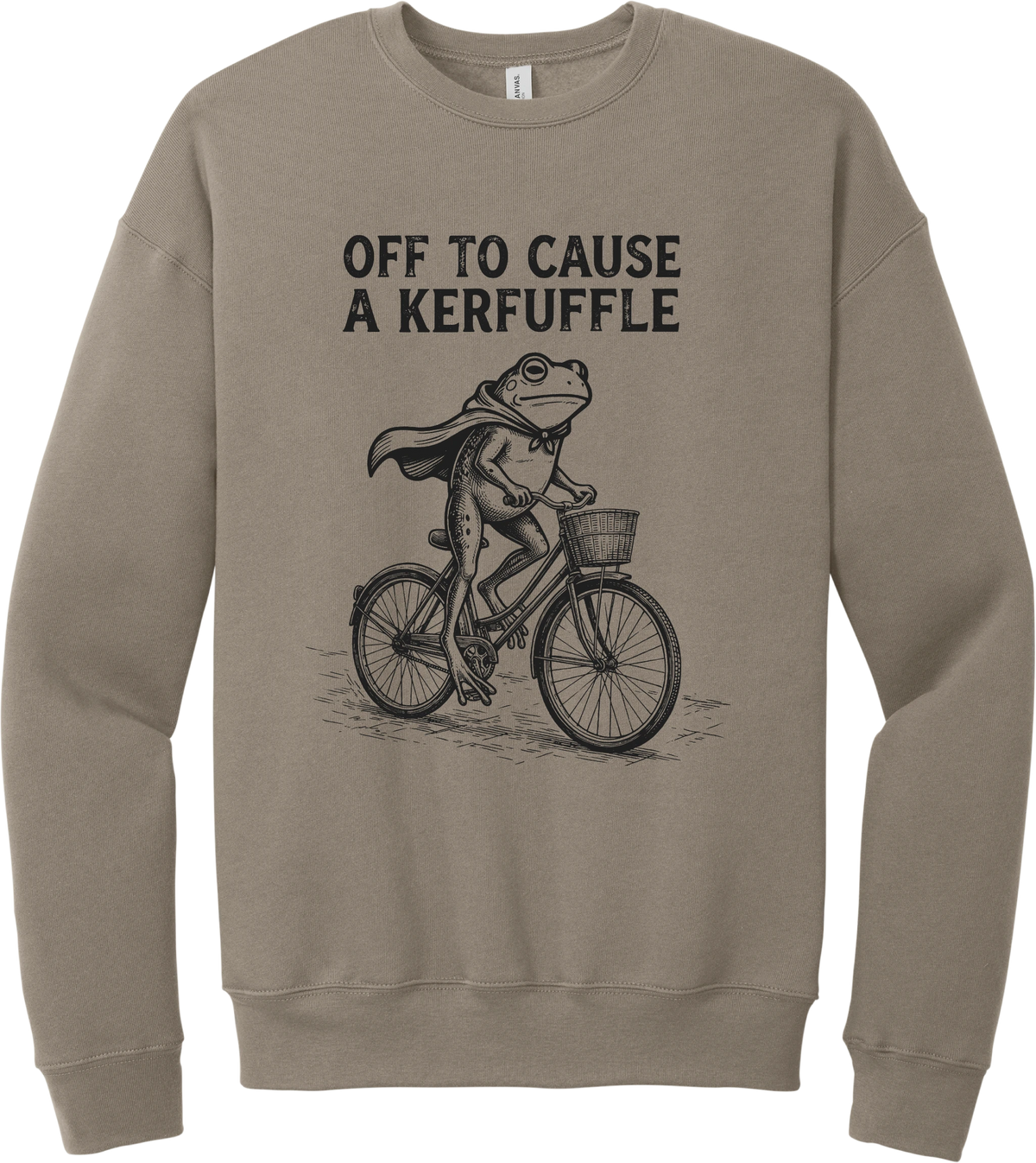 Off to Cause a Kerfuffle crewneck sweatshirt in Tan, featuring a caped frog riding a vintage bicycle with Off to cause a kerfuffle