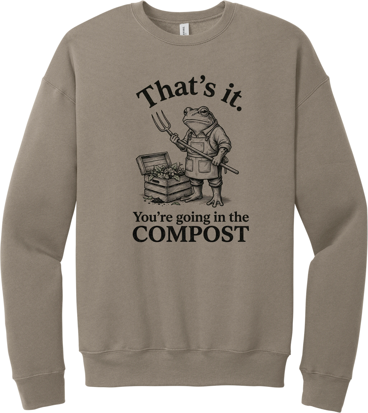 You're Going in the Compost crewneck sweatshirt in Tan, featuring a grumpy frog gardener in overalls holding a pitchfork beside a compost bin with That's it. You're going in the COMPOST