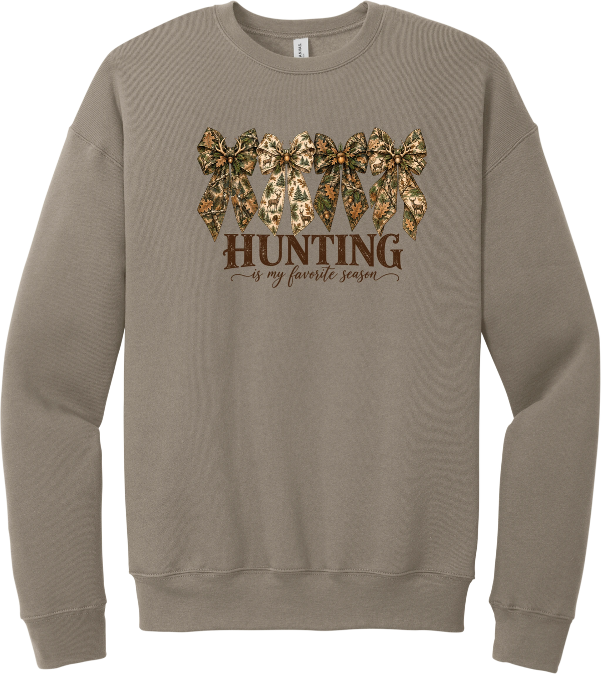 Hunting Is My Favorite Season crewneck sweatshirt in Tan, featuring four camo coquette bows with antlers, acorns, and deer above Hunting Is My Favorite Season lettering