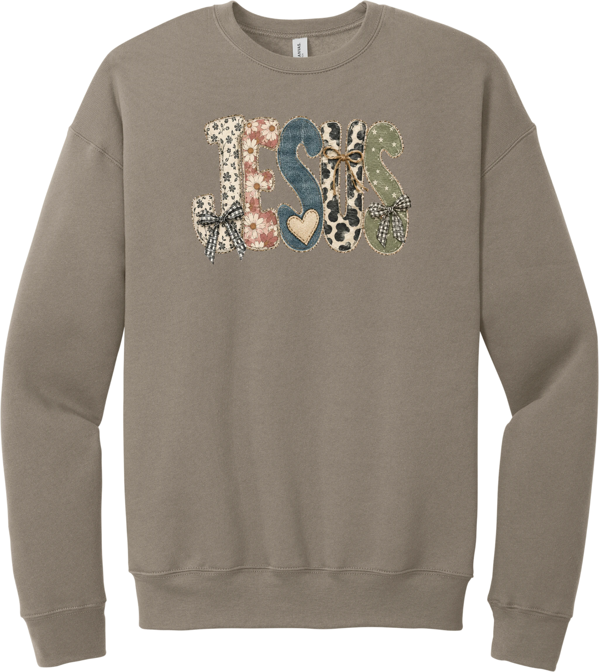 Jesus Patchwork crewneck sweatshirt in Tan, featuring JESUS in patchwork letters of floral, leopard, denim, and cow print with gingham bows and a heart
