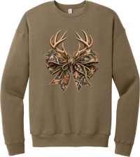 Coquette Antlers crewneck sweatshirt in Vintage Brown, featuring deer antlers tied with an oversized camo bow, twine, and autumn leaves