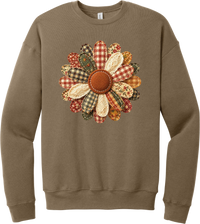 Patchwork Fabric Flower crewneck sweatshirt in Vintage Brown, featuring an oversized fabric flower with plaid, gingham, calico, and cable knit petals around a stitched rust center
